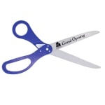 Image of ceremonial scissors with custom logo sample and blue handles.