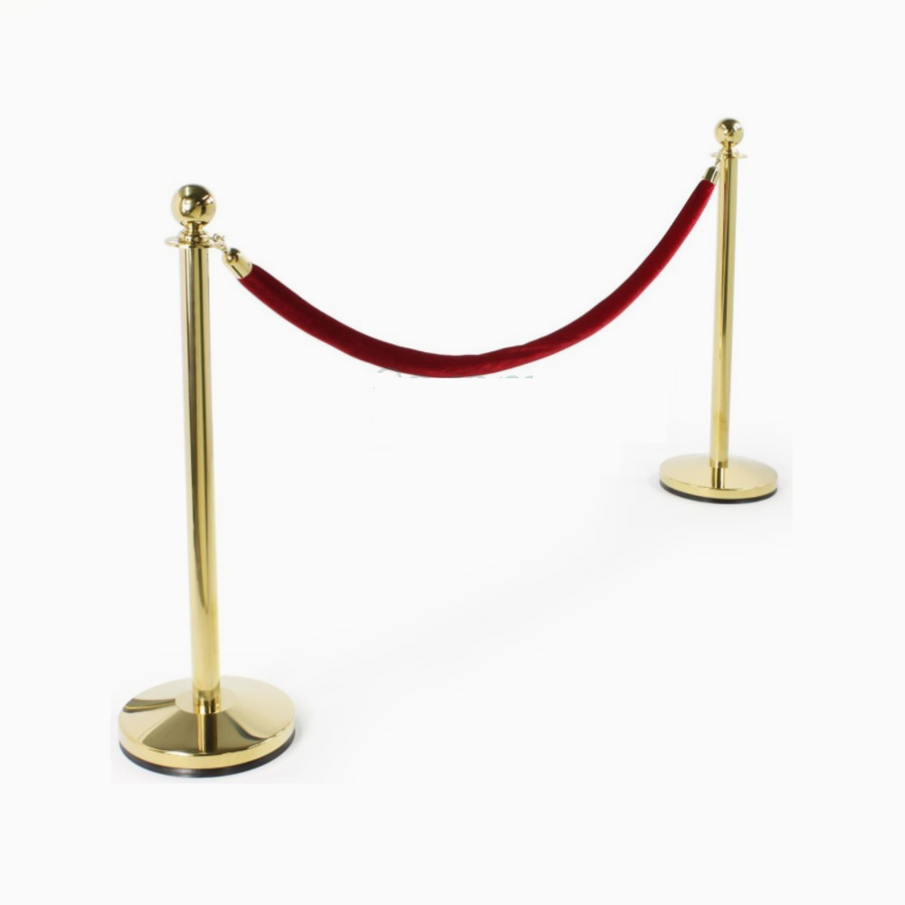 gold stanchions and red rope